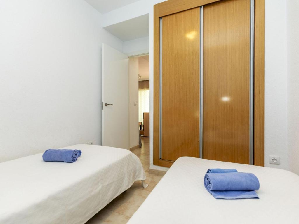 Posteľ alebo postele v izbe v ubytovaní Apartment Jardines del Mar III - Marina d'Or-3 by Interhome