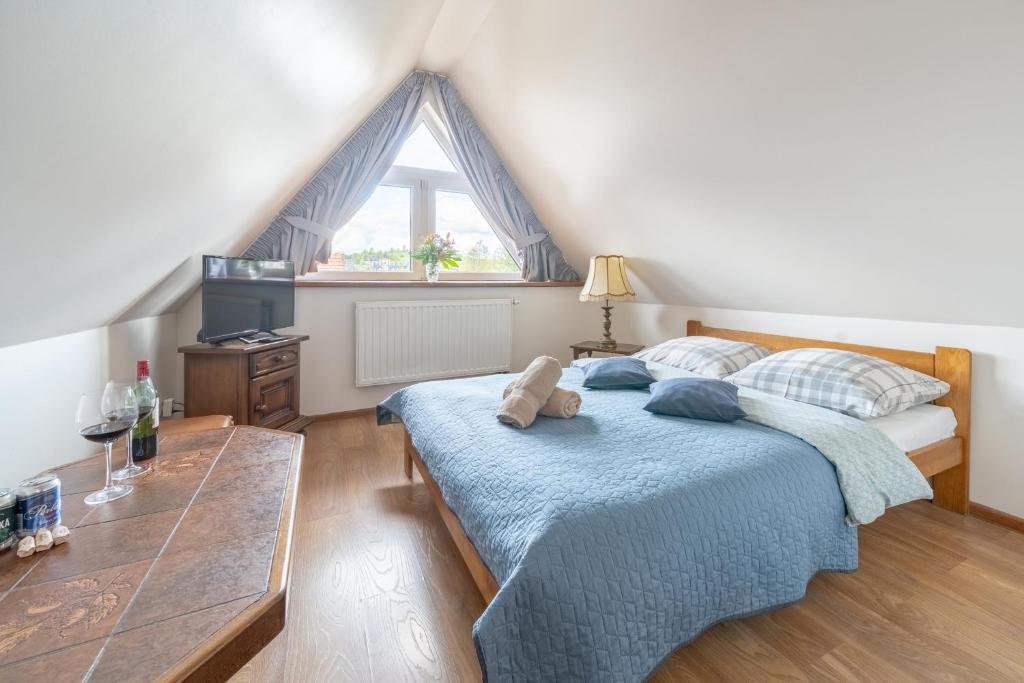 Posteľ alebo postele v izbe v ubytovaní Villa Nawrot