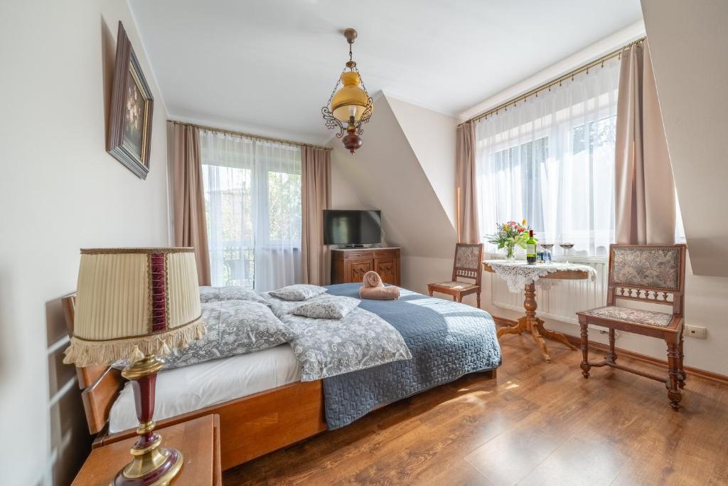 Posteľ alebo postele v izbe v ubytovaní Villa Nawrot