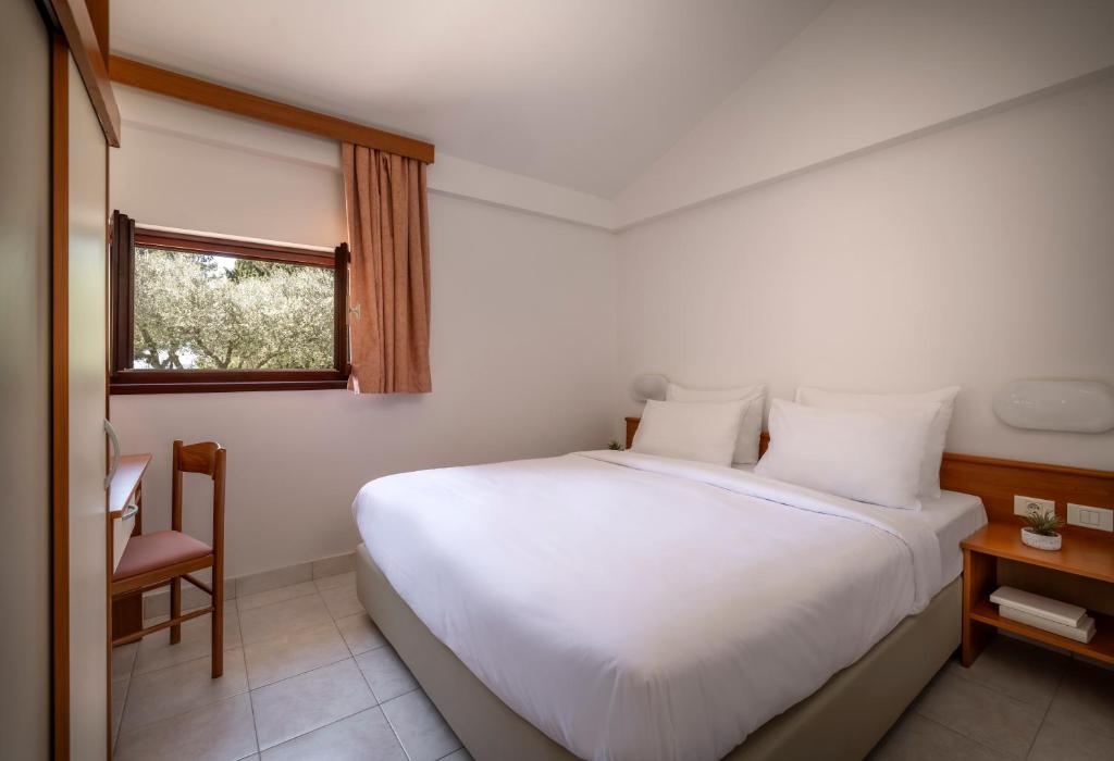 Кровать или кровати в номере Maistra Select Villas Rubin Resort
