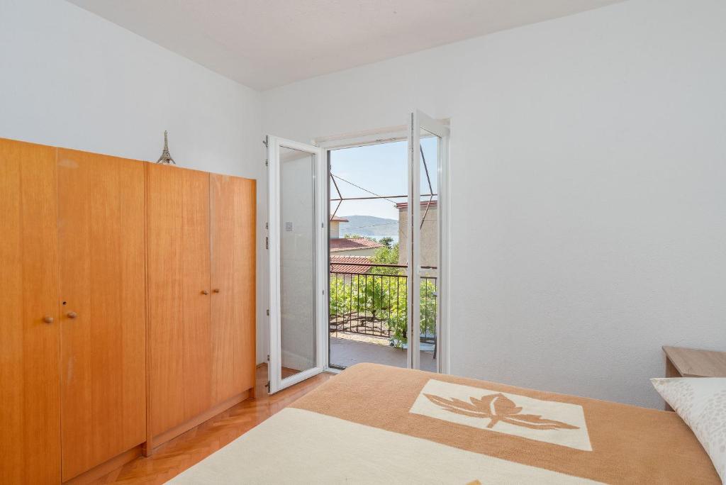 Postel nebo postele na pokoji v ubytování Apartment Sunny