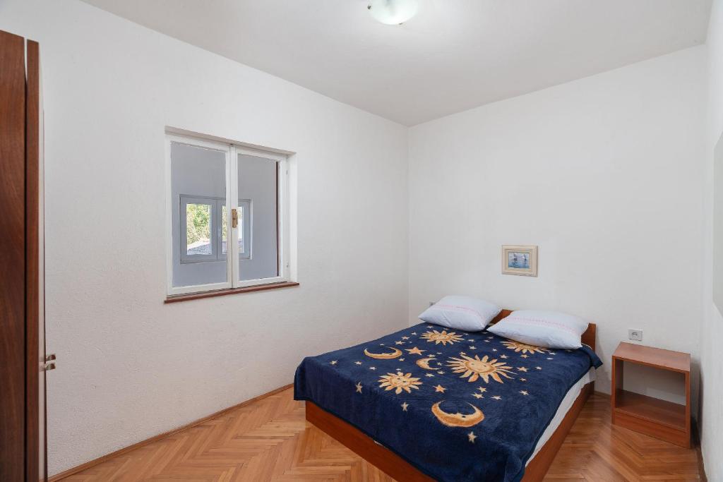 Postel nebo postele na pokoji v ubytování Apartment Sunny