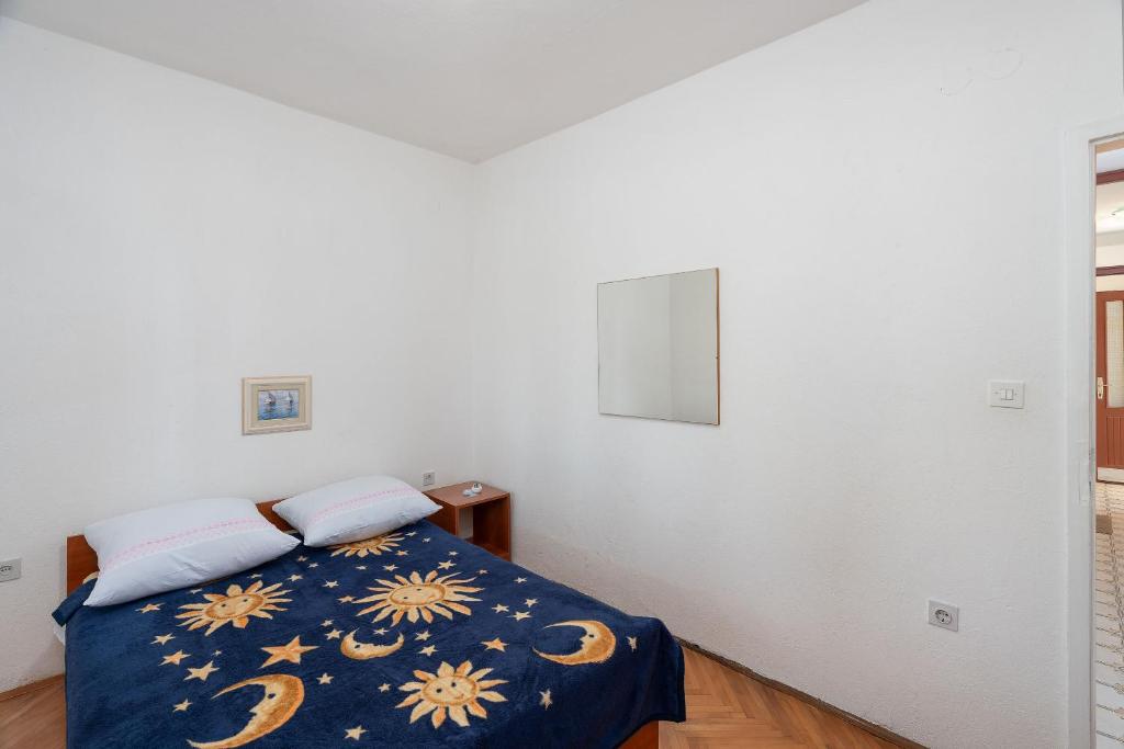 Postel nebo postele na pokoji v ubytování Apartment Sunny