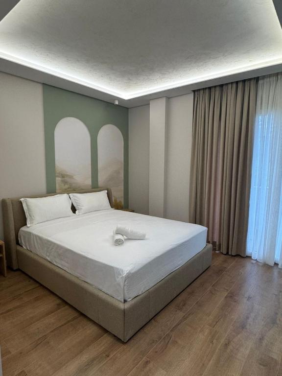 Postel nebo postele na pokoji v ubytování Zena Seaside Durres