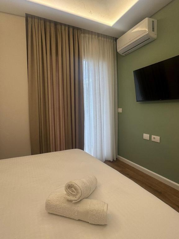 Postel nebo postele na pokoji v ubytování Zena Seaside Durres