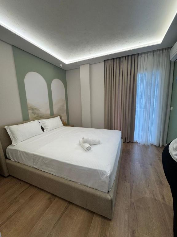 Postel nebo postele na pokoji v ubytování Zena Seaside Durres