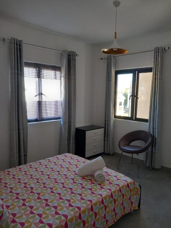 Postel nebo postele na pokoji v ubytování Ibis Tourist Residence 1