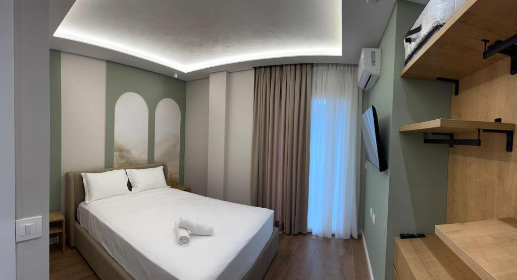 Postel nebo postele na pokoji v ubytování Zena Seaside Durres