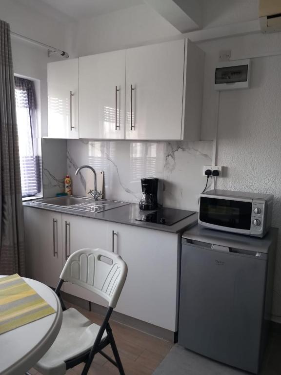 Kuchyň nebo kuchyňský kout v ubytování Ibis Tourist Residence 1