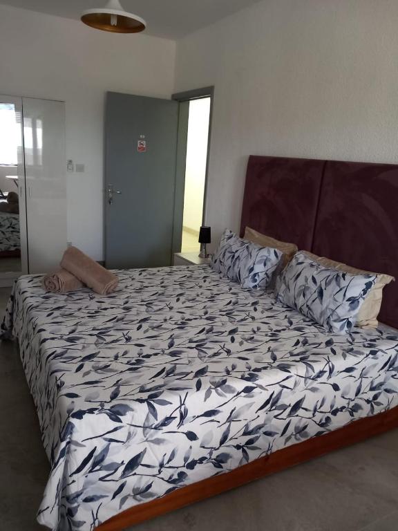 Postel nebo postele na pokoji v ubytování Ibis Tourist Residence 1