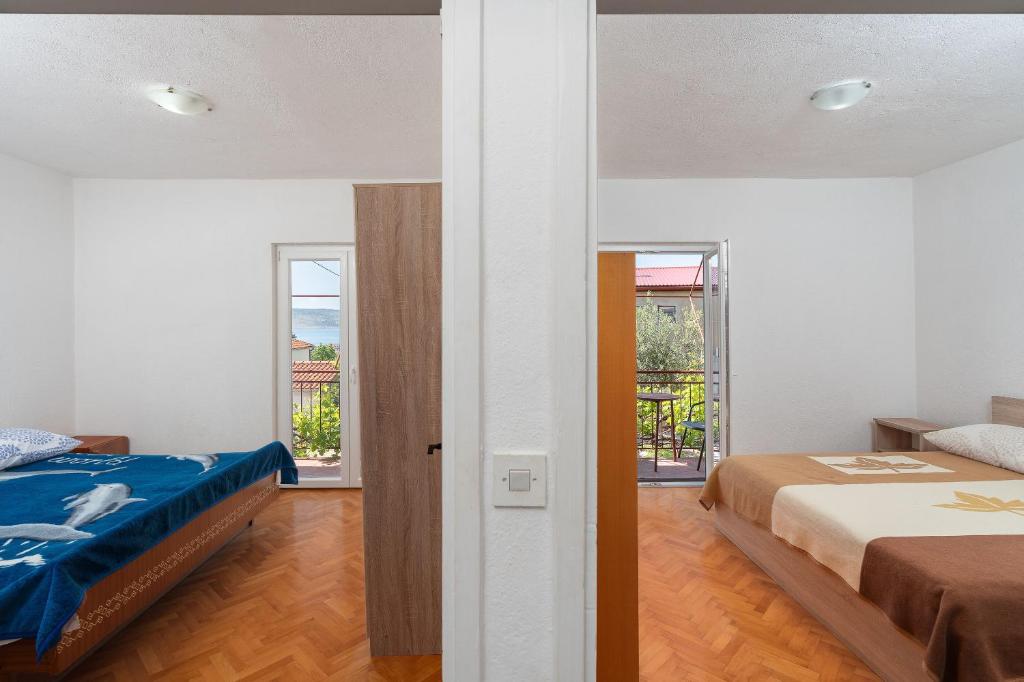 Postel nebo postele na pokoji v ubytování Apartment Sunny