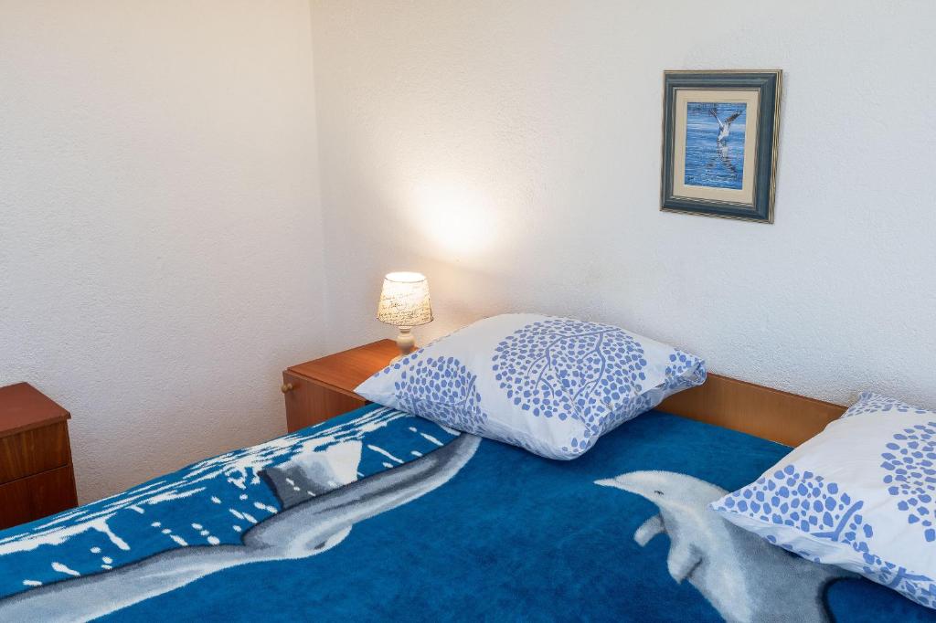 Postel nebo postele na pokoji v ubytování Apartment Sunny