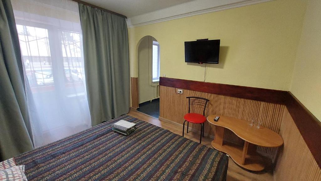 TV a/nebo společenská místnost v ubytování Hotel Desna KUT