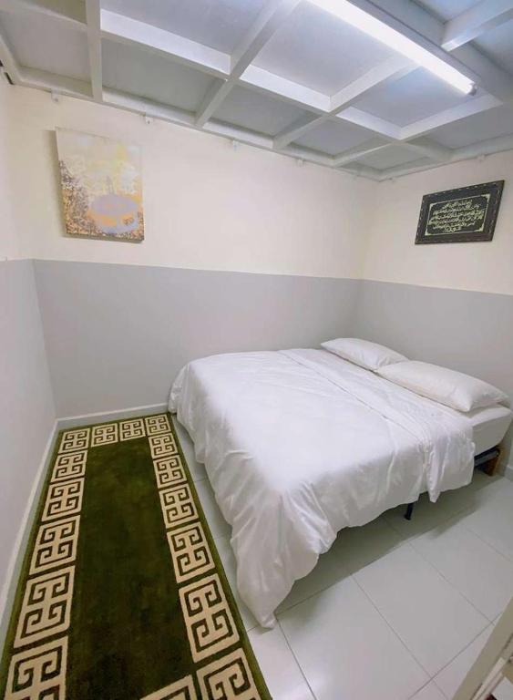 Postel nebo postele na pokoji v ubytování Homestay DAR AL - JUFRY Musliim only