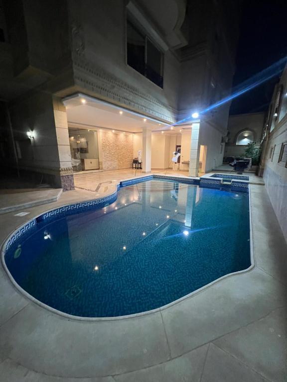 Bazén v ubytování Private Pool Suite nebo v jeho okolí