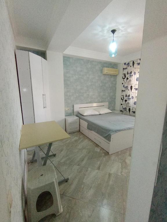Postel nebo postele na pokoji v ubytování Guest House Guriani