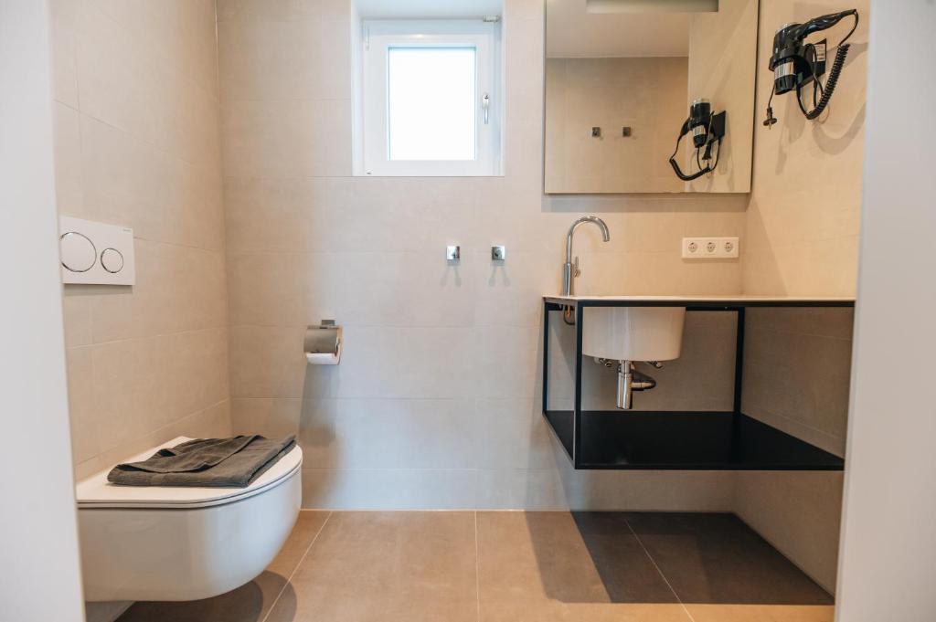 Koupelna v ubytování Hotel - B&B Renesse