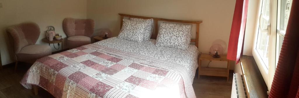 Postel nebo postele na pokoji v ubytování B&B Le Bois de Champia