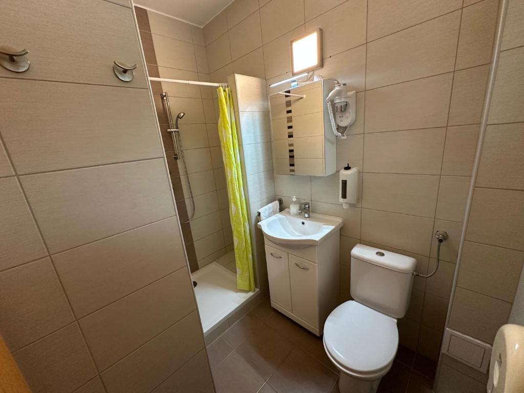 Koupelna v ubytování Siesta Club Apartman Harkány