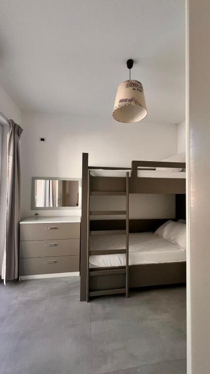 Postel nebo postele na pokoji v ubytování Hotel Brilant