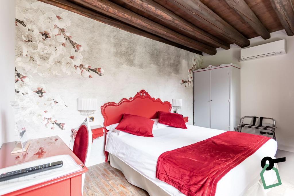 Postel nebo postele na pokoji v ubytování HOTIDAY Room Collection - Dolo