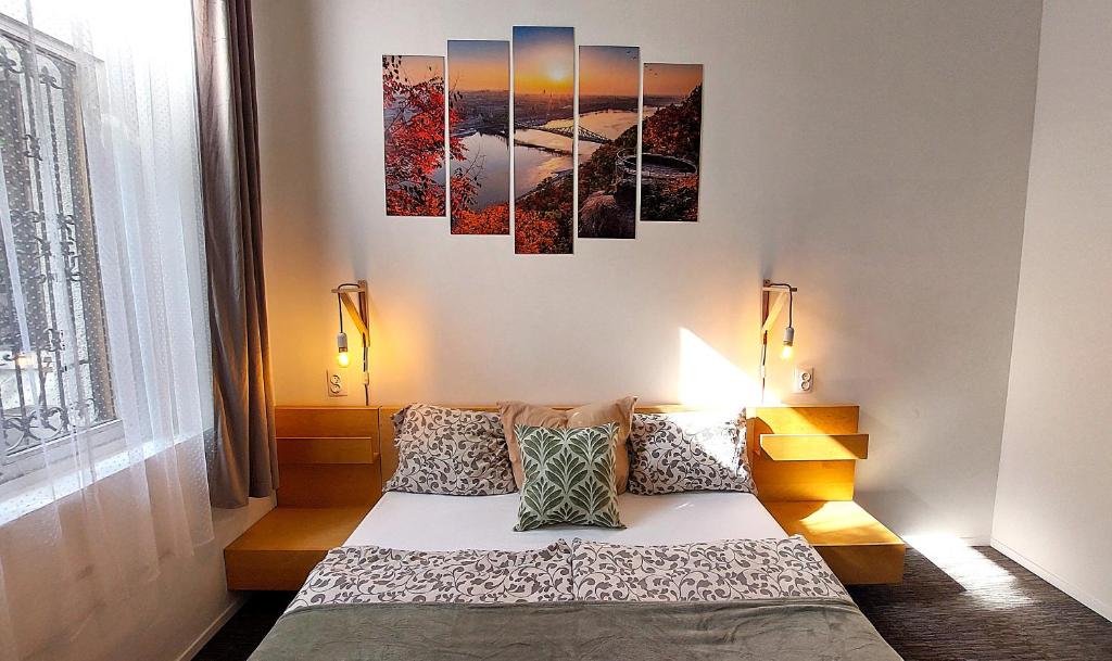 Postel nebo postele na pokoji v ubytování GoodMo Budapest Smart Rooms