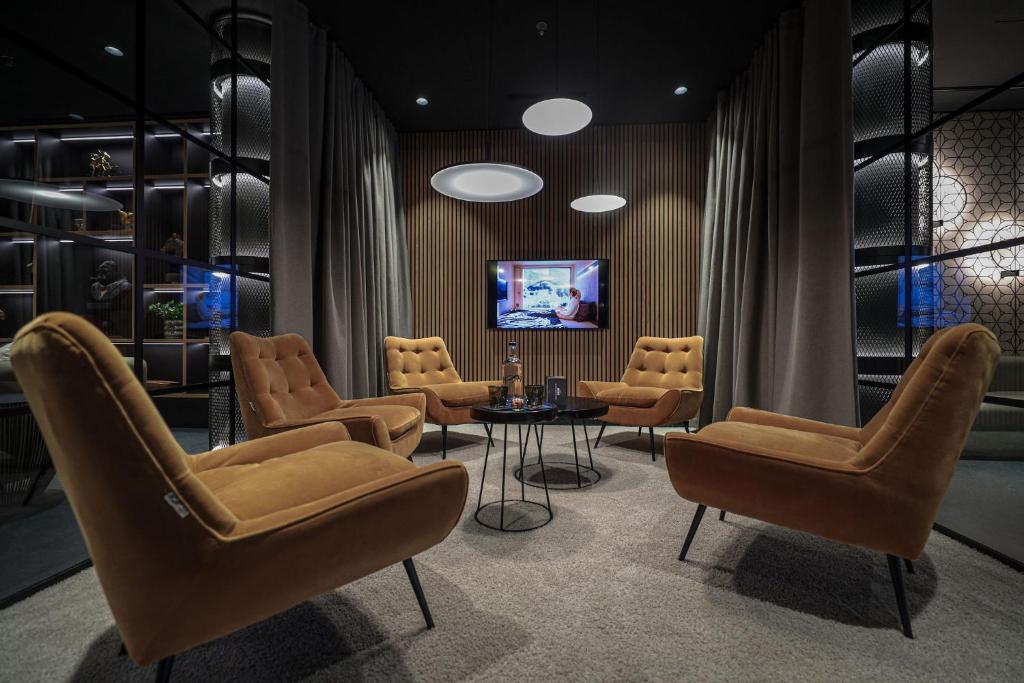 TV a/nebo společenská místnost v ubytování Revier Hotel Säntispark