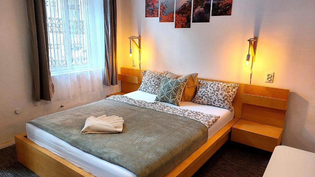 Postel nebo postele na pokoji v ubytování GoodMo Budapest Smart Rooms