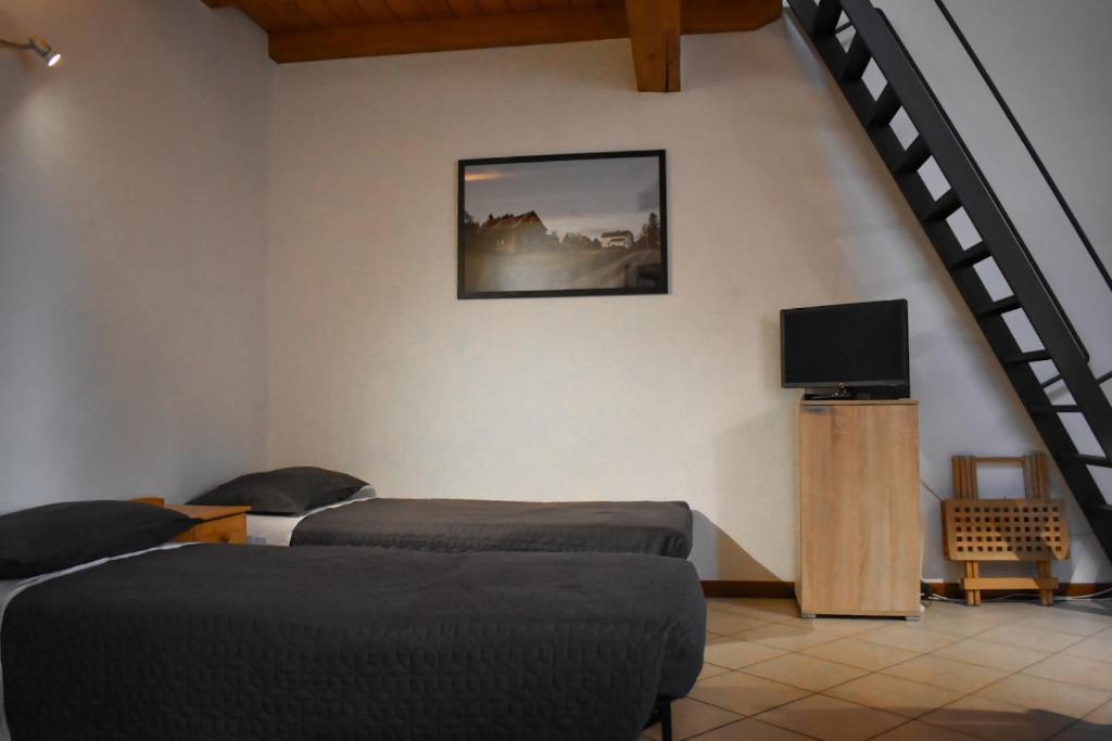 Televízia a/alebo spoločenská miestnosť v ubytovaní Ciceri Properties Antonio Tacchini