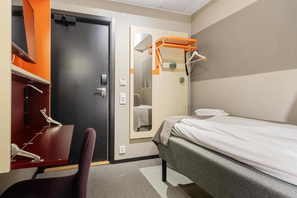 Postel nebo postele na pokoji v ubytování Best Western Hotel Norrkoping City
