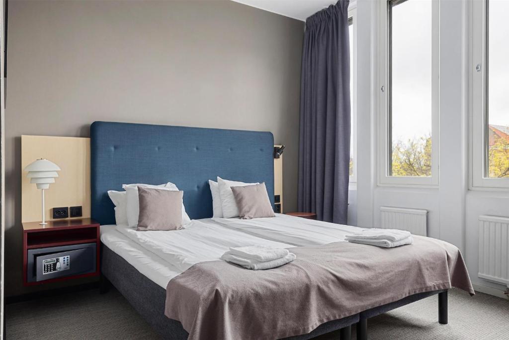 Postel nebo postele na pokoji v ubytování Best Western Hotel Norrkoping City
