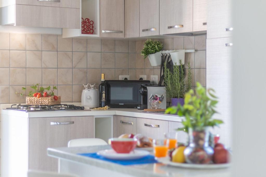 Dapur atau dapur kecil di APPARTAMENTO - IL DICIOTTESIMO SOLE