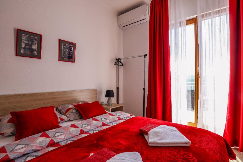 Postel nebo postele na pokoji v ubytování Rooms Bačić