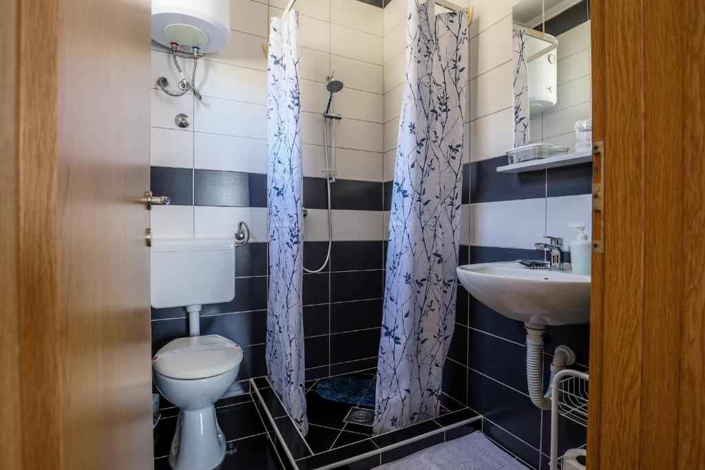 Koupelna v ubytování Rooms Bačić