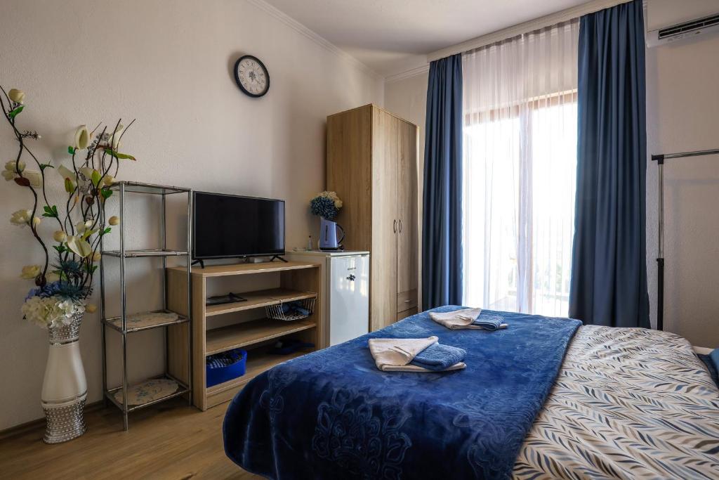 Postel nebo postele na pokoji v ubytování Rooms Bačić