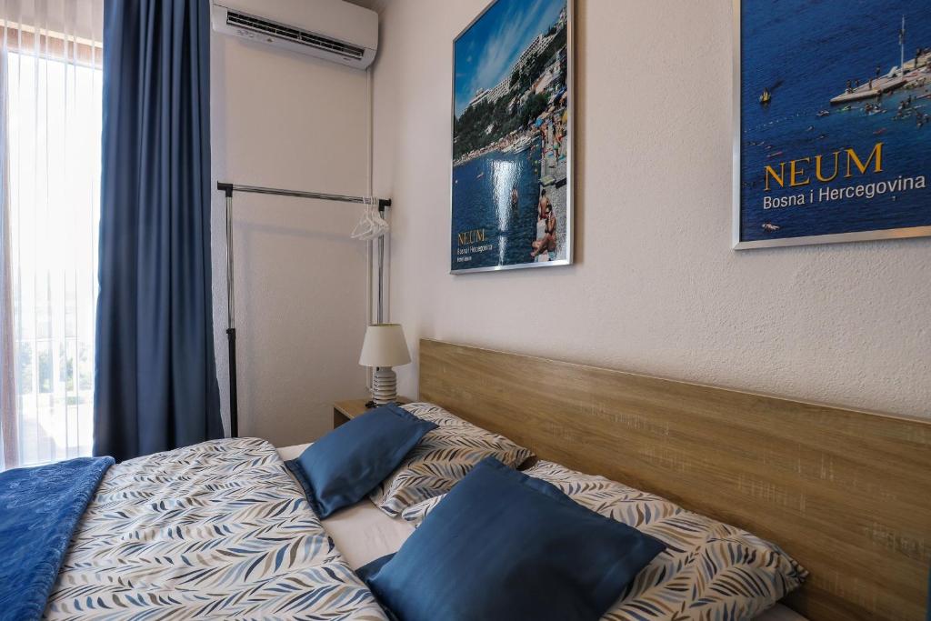Postel nebo postele na pokoji v ubytování Rooms Bačić
