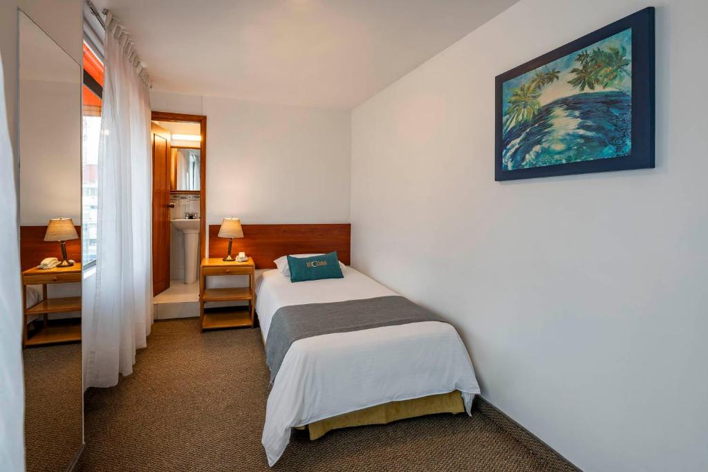 Postel nebo postele na pokoji v ubytování Hotel El Campin