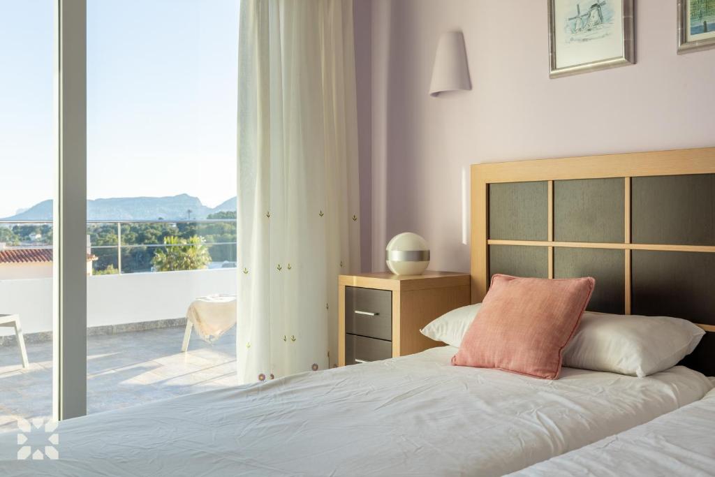 Postel nebo postele na pokoji v ubytování Villa Bernia by Abahana Villas