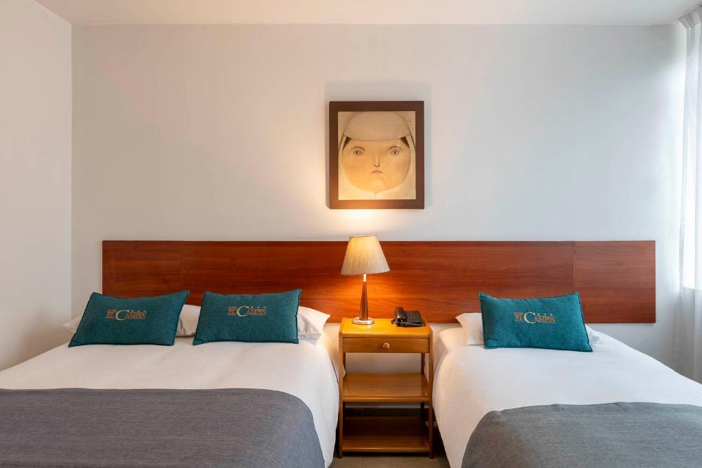Postel nebo postele na pokoji v ubytování Hotel El Campin