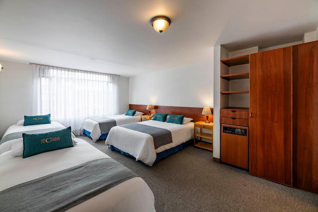 Postel nebo postele na pokoji v ubytování Hotel El Campin
