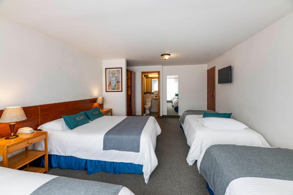 Postel nebo postele na pokoji v ubytování Hotel El Campin