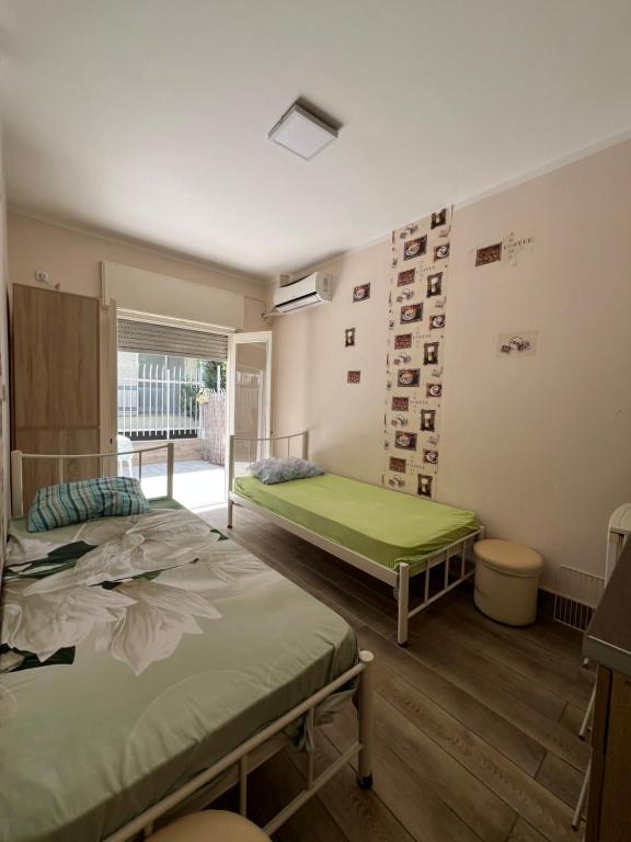 Ένα ή περισσότερα κρεβάτια σε δωμάτιο στο Todevski Apartment
