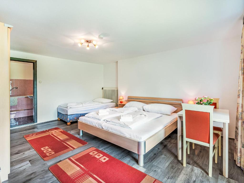 Postel nebo postele na pokoji v ubytování Holiday Home Zeitlos by Interhome