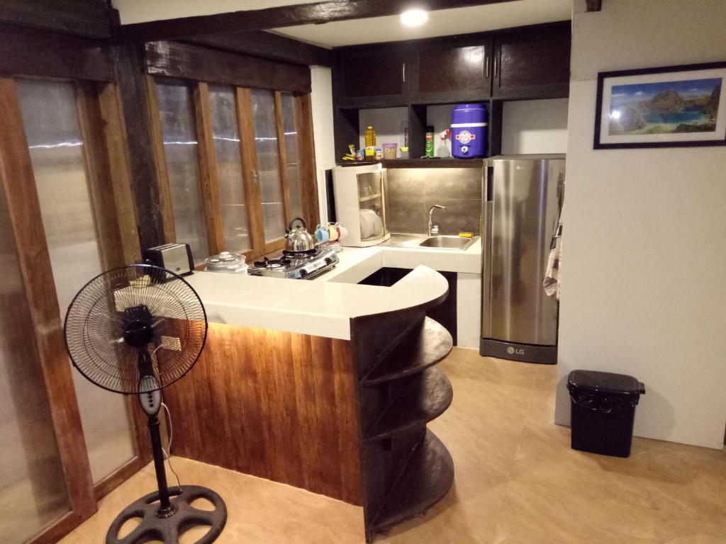 Η κουζίνα ή μικρή κουζίνα στο El Nido downtown apartment