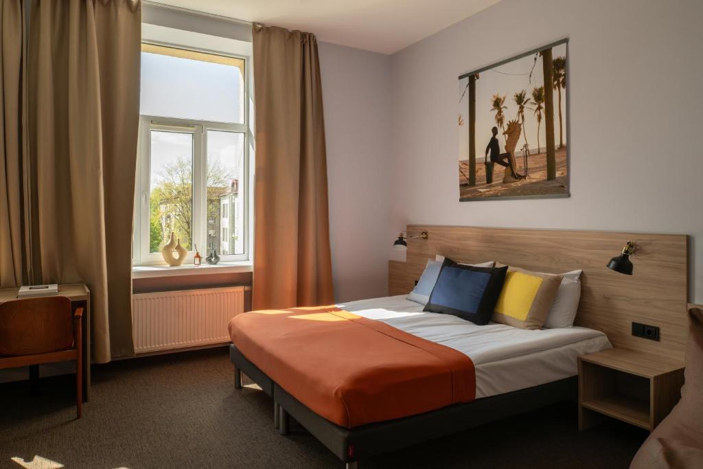 Postel nebo postele na pokoji v ubytování Corner Hotel