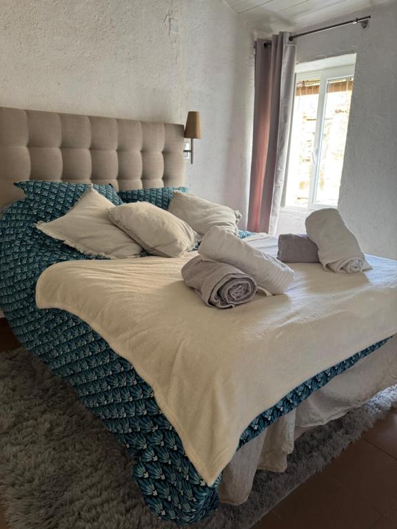 Postel nebo postele na pokoji v ubytování Joli T2 in Cap Corse