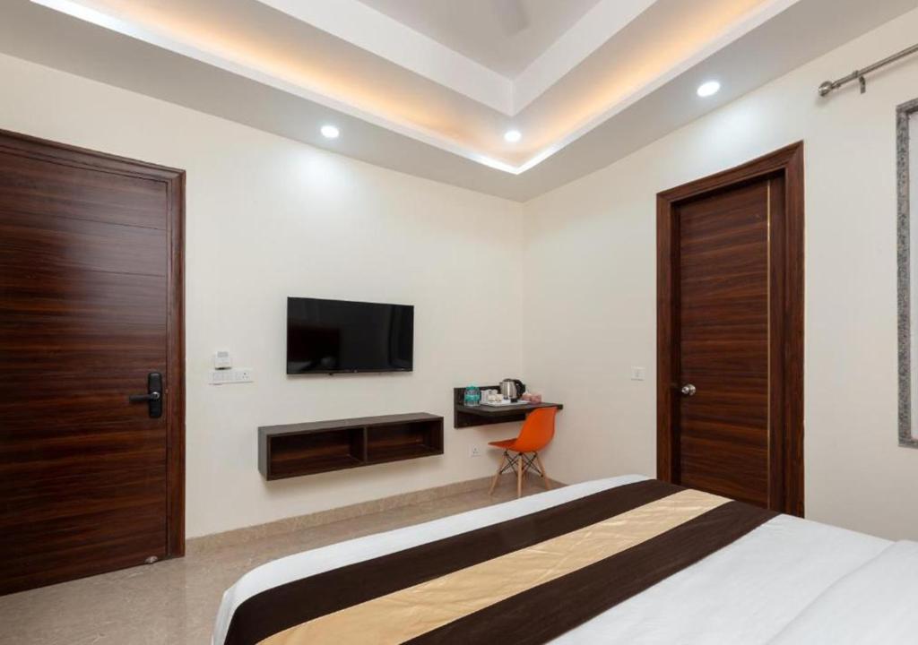 TV a/nebo společenská místnost v ubytování Comfort N Stay INN Suites