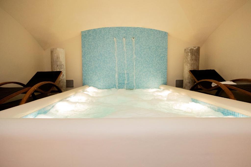 Postel nebo postele na pokoji v ubytování Hotel Metropole Taormina