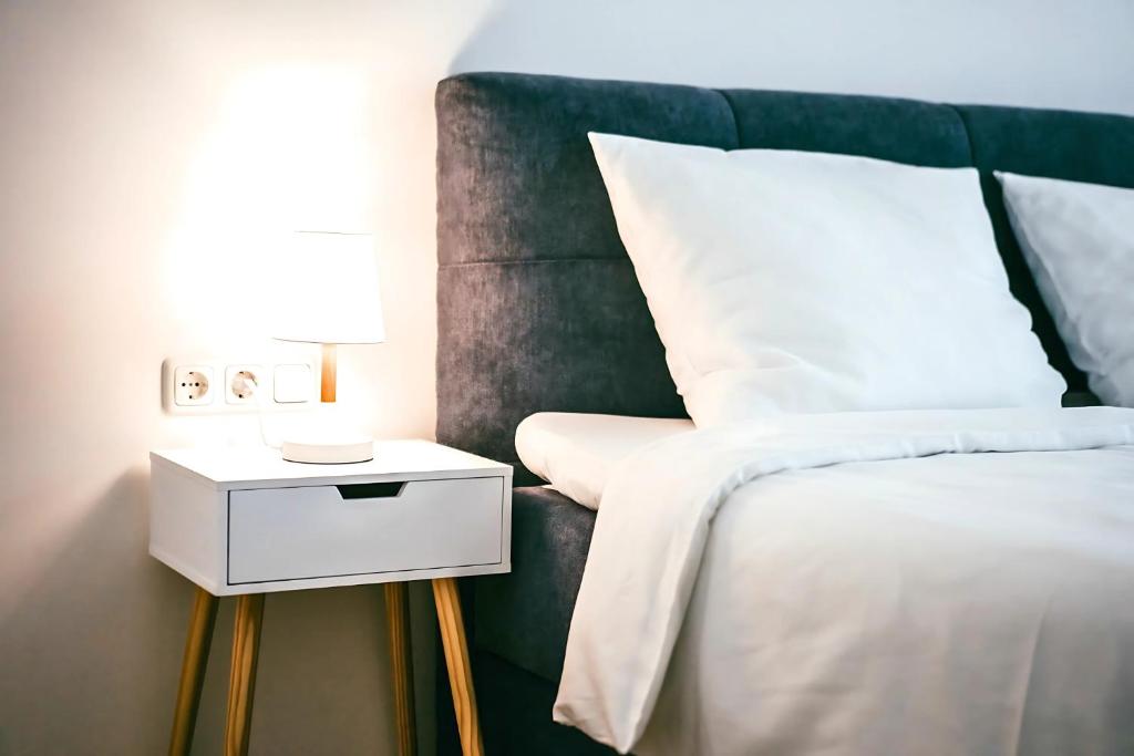 Postel nebo postele na pokoji v ubytování Family Suite