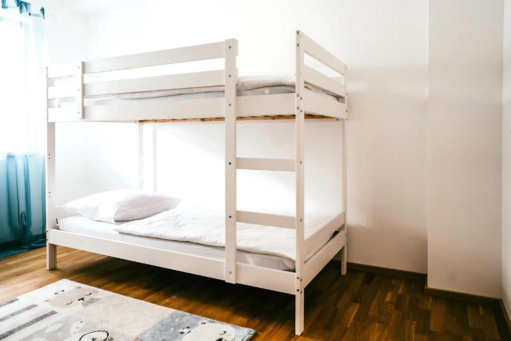 Postel nebo postele na pokoji v ubytování Family Suite